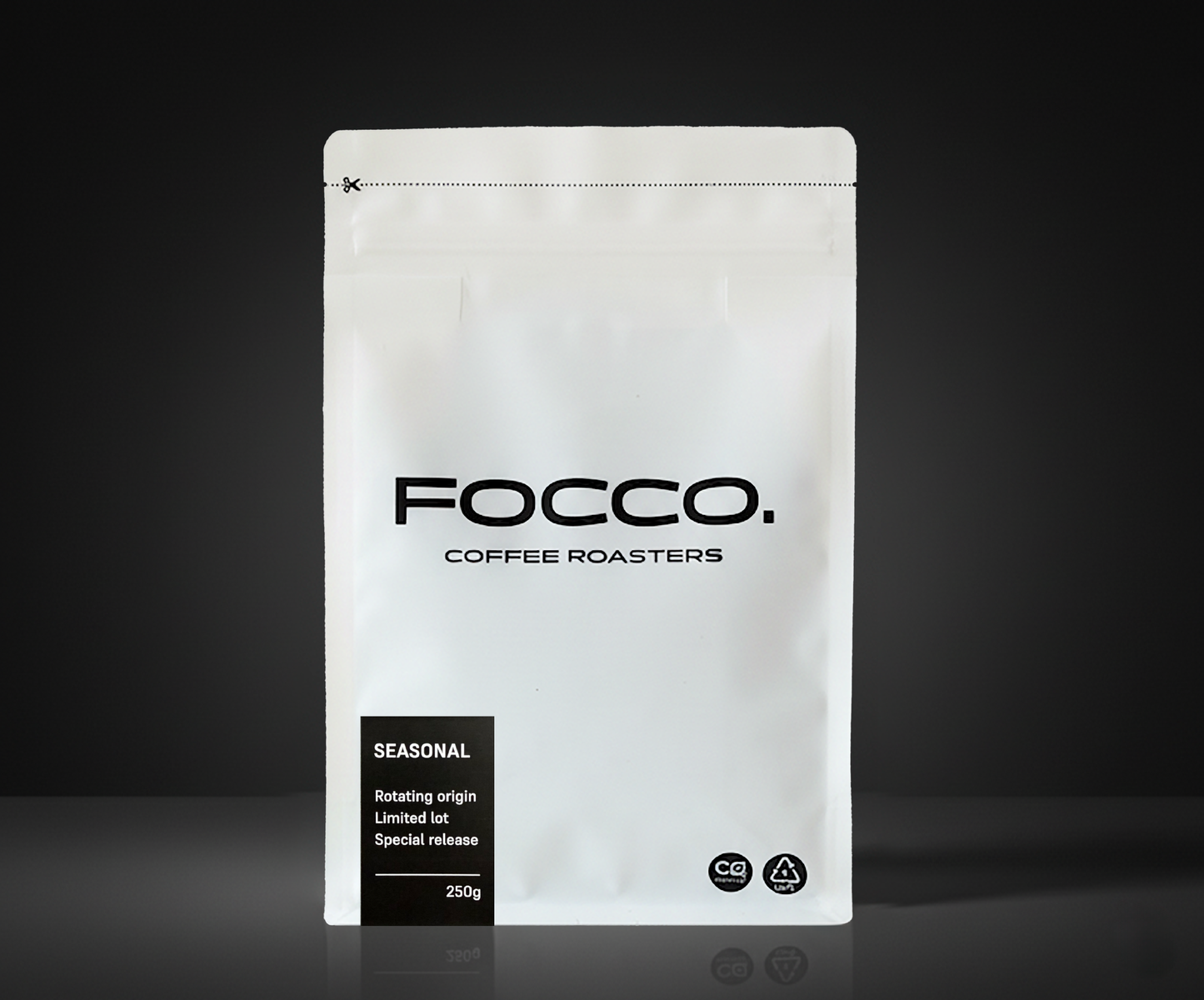 White coffee bag with 'FOCCO. Coffee Roasters' branding on a black background